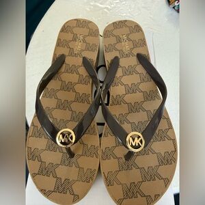 Michael Kors Tan and Brown Flip Flops with Gold Emblem